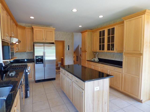 41W951 Hunters Hill Dr, Saint Charles, IL 60175 - kitchen with appliances with stainless steel finishes, ventilation hood, light tile patterned floors, glass insert cabinets, and decorative backsplash