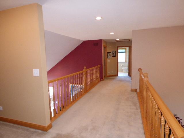 41W951 Hunters Hill Dr, Saint Charles, IL 60175 - corridor featuring an upstairs landing, recessed lighting, light carpet, and lofted ceiling
