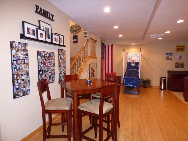 41W951 Hunters Hill Dr, Saint Charles, IL 60175 - dining space with recessed lighting, light wood-style floors, and stairs