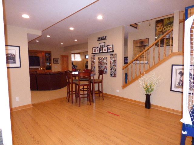 41W951 Hunters Hill Dr, Saint Charles, IL 60175 - dining room with wood finished floors, recessed lighting, and stairway