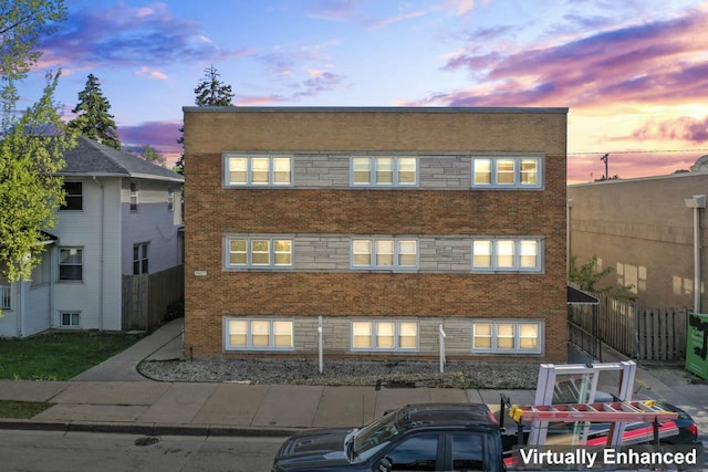 5927 W Addison St Unit 2D, Chicago, IL 60634 - view of front facade featuring brick siding