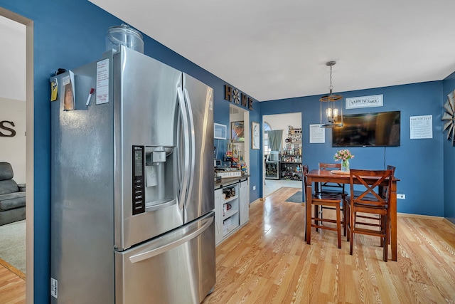 1308 Cumberland Dr, Joliet, IL 60431 - kitchen with stainless steel fridge with ice dispenser, light wood-style flooring, and decorative light fixtures