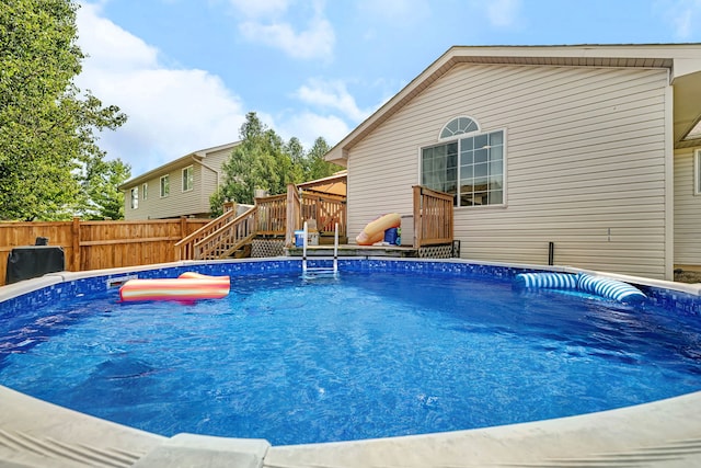 1308 Cumberland Dr, Joliet, IL 60431 - view of pool featuring a wooden deck and stairs