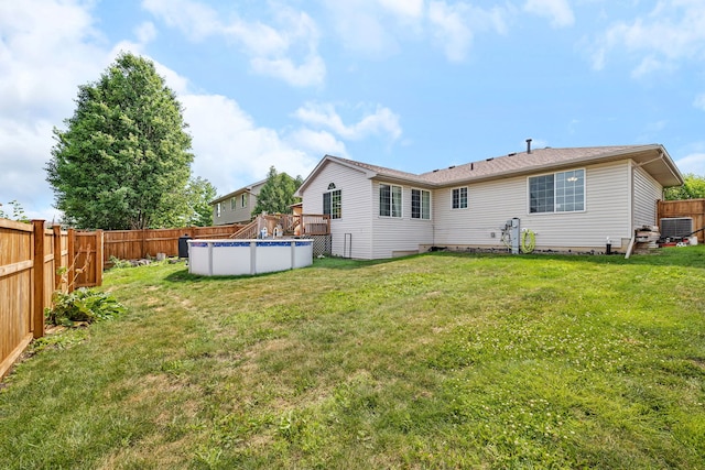 1308 Cumberland Dr, Joliet, IL 60431 - back of house with a fenced backyard and crawl space
