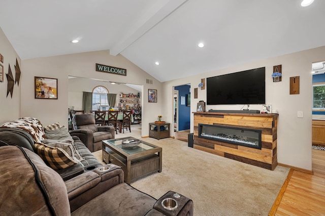 1308 Cumberland Dr, Joliet, IL 60431 - living area featuring wood finished floors, healthy amount of natural light, recessed lighting, and a glass covered fireplace