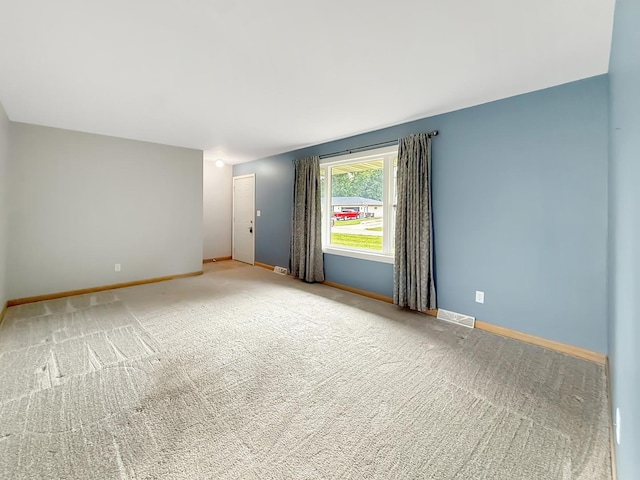 701 E Soper St, Winnebago, IL 61088 - empty room featuring carpet floors