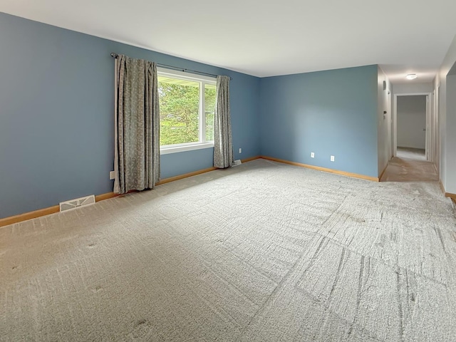 701 E Soper St, Winnebago, IL 61088 - spare room featuring carpet