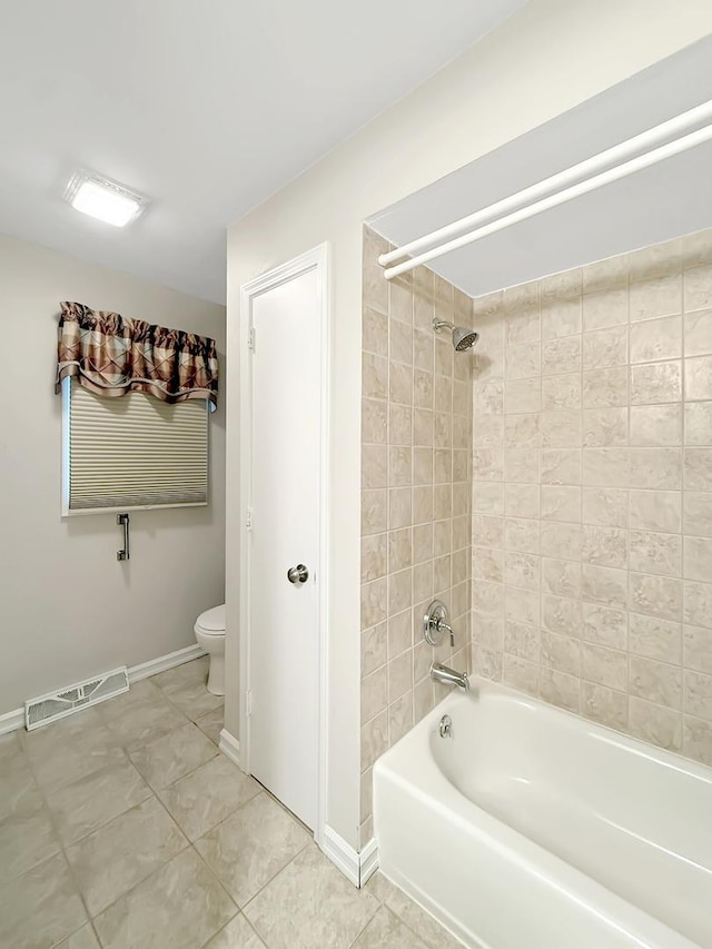 701 E Soper St, Winnebago, IL 61088 - full bath with shower / bath combination and tile patterned flooring