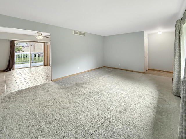 701 E Soper St, Winnebago, IL 61088 - spare room featuring ceiling fan and carpet