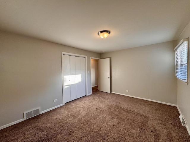 900 W Strieff Ln, Glenwood, IL 60425 - unfurnished bedroom with carpet and a closet