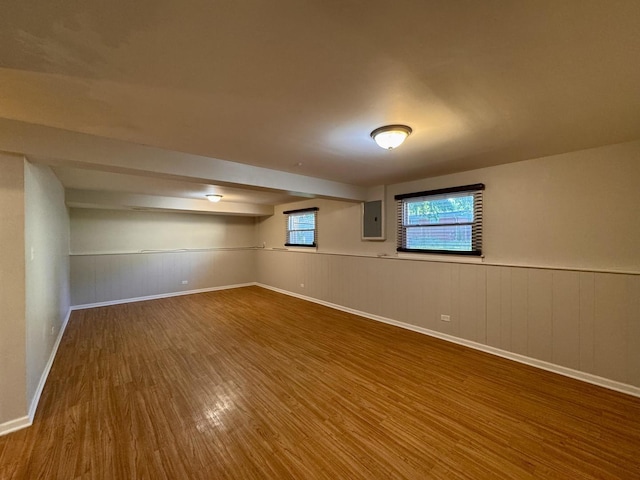 900 W Strieff Ln, Glenwood, IL 60425 - spare room with wood finished floors, electric panel, and a wainscoted wall