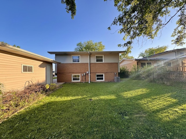 900 W Strieff Ln, Glenwood, IL 60425 - rear view of property featuring brick siding