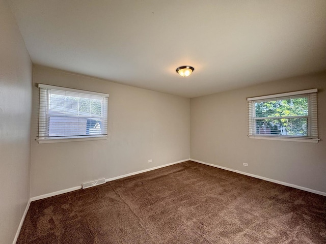 900 W Strieff Ln, Glenwood, IL 60425 - carpeted empty room featuring baseboards