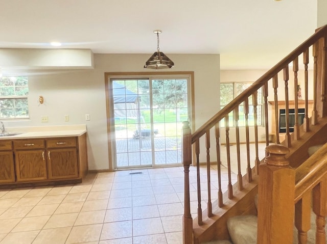 1858 David Ave, Joliet, IL 60433 - foyer with light tile patterned flooring and stairway