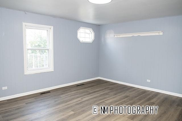 9828 Warren Ave, Oak Lawn, IL 60453 - spare room with wood finished floors