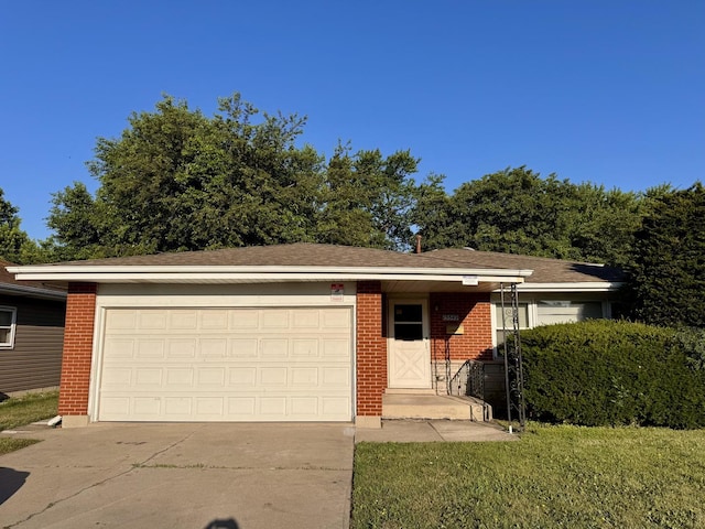 15542 S Park Ave, South Holland, IL 60473 - view of front of home with brick siding, driveway, a garage, and a front lawn