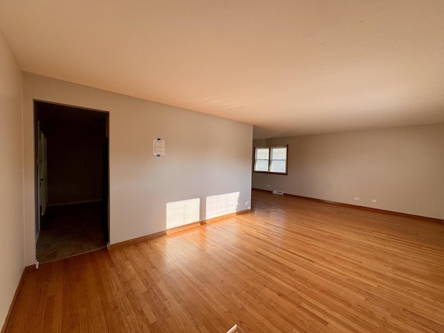 15542 S Park Ave, South Holland, IL 60473 - empty room with light wood-style flooring and baseboards