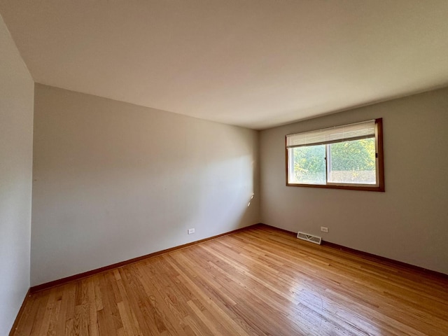 15542 S Park Ave, South Holland, IL 60473 - empty room featuring light wood-style floors