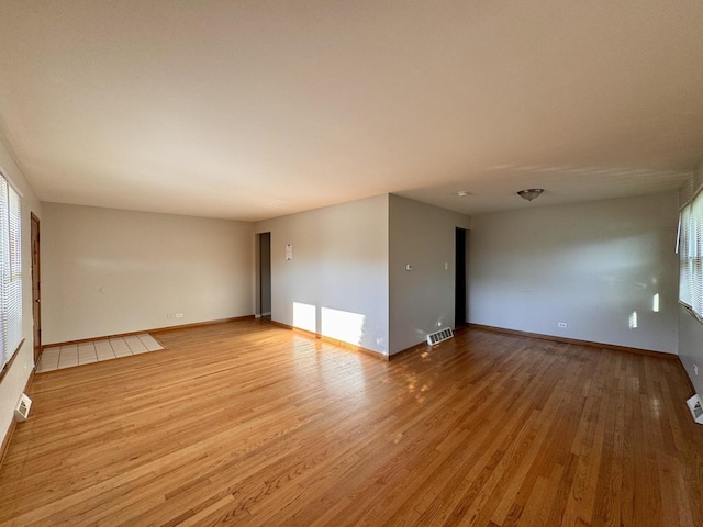 15542 S Park Ave, South Holland, IL 60473 - unfurnished room with light wood-style floors and baseboards