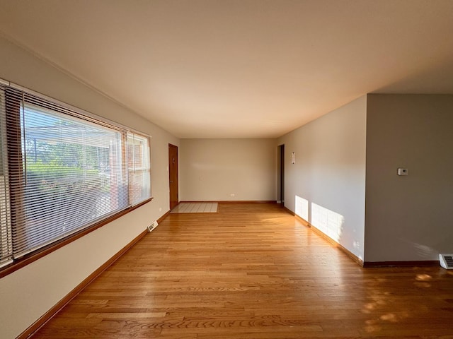 15542 S Park Ave, South Holland, IL 60473 - unfurnished room with light wood-style flooring and baseboards