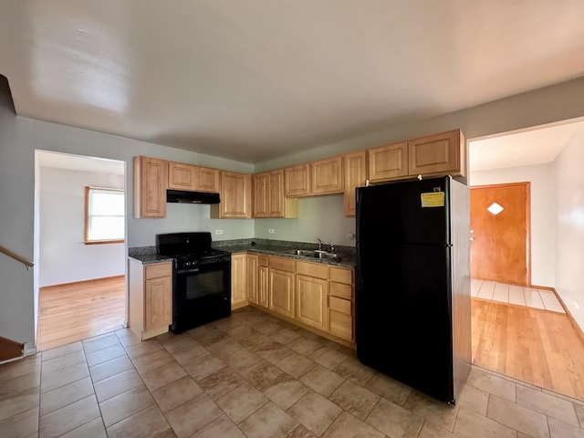15542 S Park Ave, South Holland, IL 60473 - kitchen with black appliances, under cabinet range hood, light brown cabinetry, and dark stone countertops