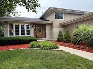 16529 Edgewood Dr, Plainfield, IL 60586 - tri-level home featuring a front yard