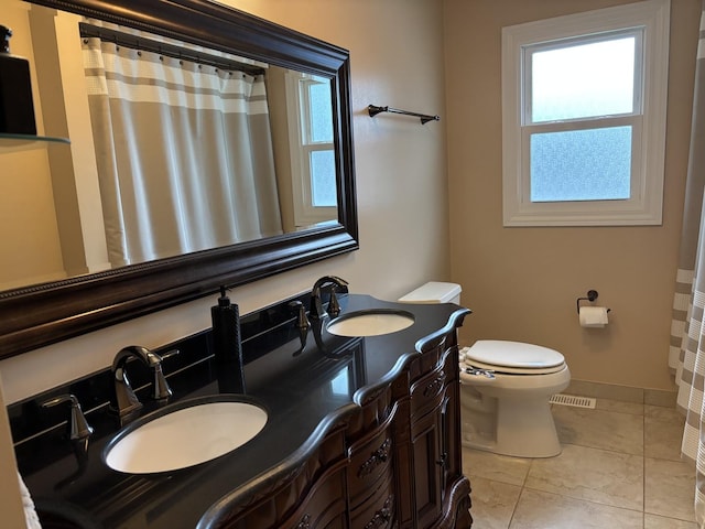 16529 Edgewood Dr, Plainfield, IL 60586 - bathroom with healthy amount of natural light, double vanity, and curtained shower