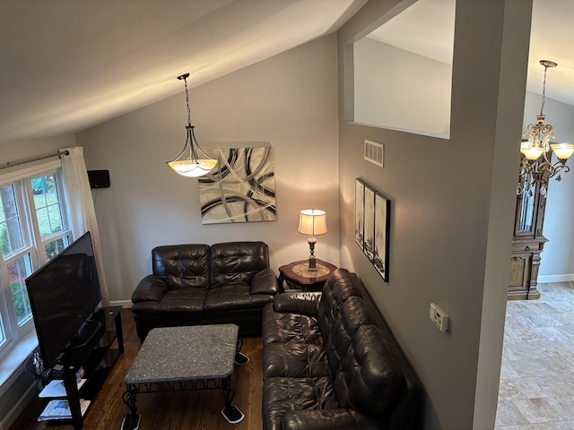 16529 Edgewood Dr, Plainfield, IL 60586 - living area with a chandelier and high vaulted ceiling