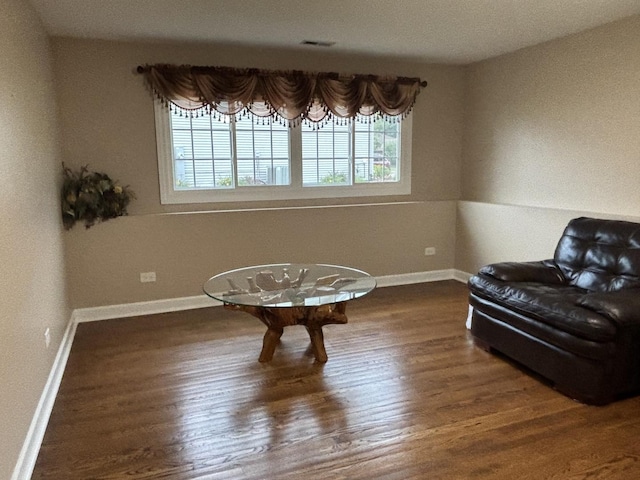 16529 Edgewood Dr, Plainfield, IL 60586 - living area featuring wood finished floors and baseboards
