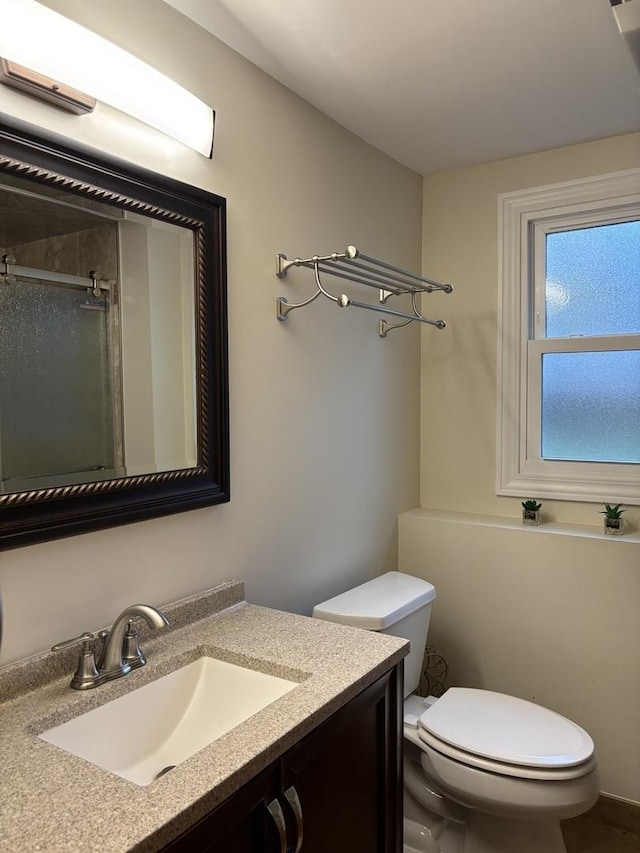 16529 Edgewood Dr, Plainfield, IL 60586 - bathroom featuring a shower with shower door and vanity