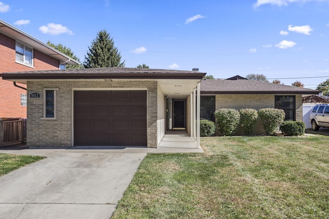 9613 S Kostner Ave, Oak Lawn, IL 60453 - view of front facade featuring an attached garage, concrete driveway, a front lawn, and brick siding