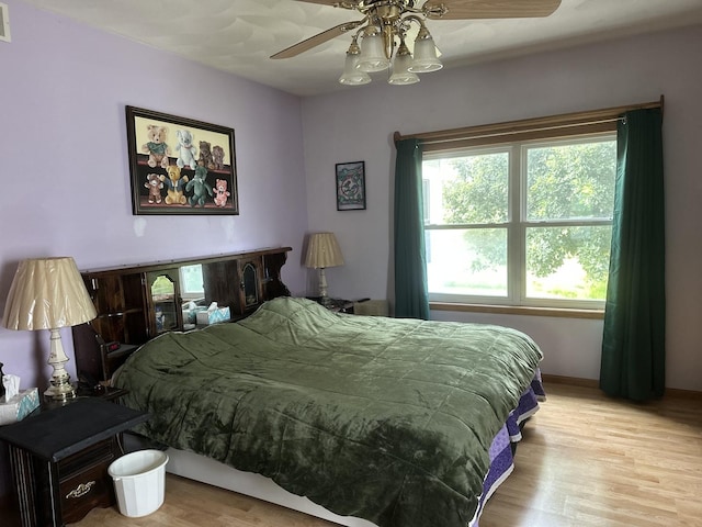 1959 W Navajo Dr, Freeport, IL 61032 - bedroom with wood finished floors and ceiling fan