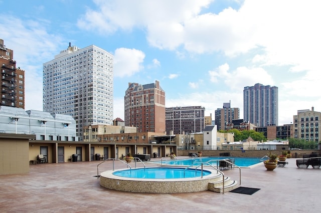 655 W Irving Park Rd Unit 5504, Chicago, IL 60613 - community pool with a view of skyline