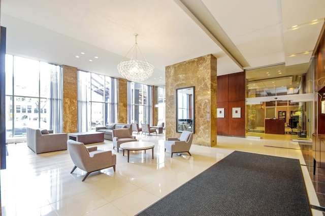 655 W Irving Park Rd Unit 5504, Chicago, IL 60613 - lobby featuring expansive windows and a towering ceiling