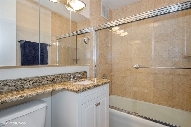 655 W Irving Park Rd Unit 5504, Chicago, IL 60613 - full bathroom with shower / bath combination with glass door and vanity