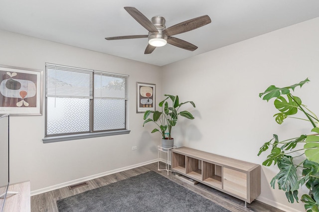 8306 Portsmouth Dr Unit 22B, Darien, IL 60561 - living area featuring wood finished floors and a ceiling fan