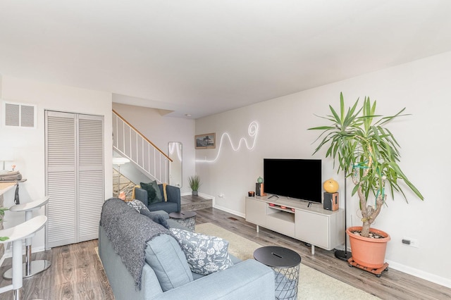 8306 Portsmouth Dr Unit 22B, Darien, IL 60561 - living room featuring stairway and wood finished floors