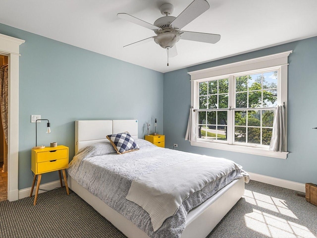 2207 N Elmkirk Pkwy N, Mchenry, IL 60051 - carpeted bedroom with baseboards and ceiling fan