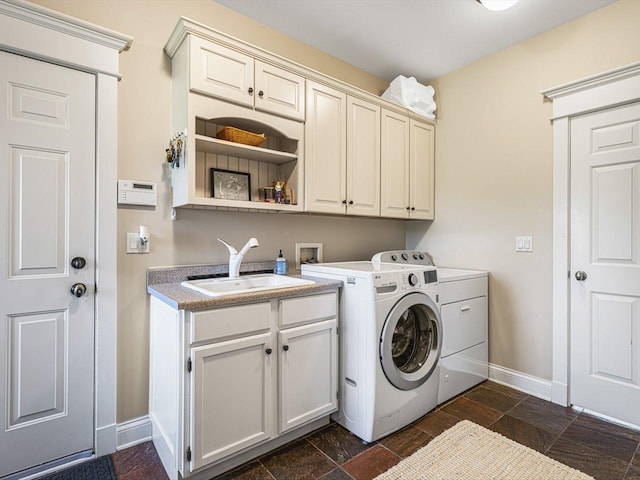 2207 N Elmkirk Pkwy N, Mchenry, IL 60051 - laundry area featuring separate washer and dryer, cabinet space, and dark stone finish floors