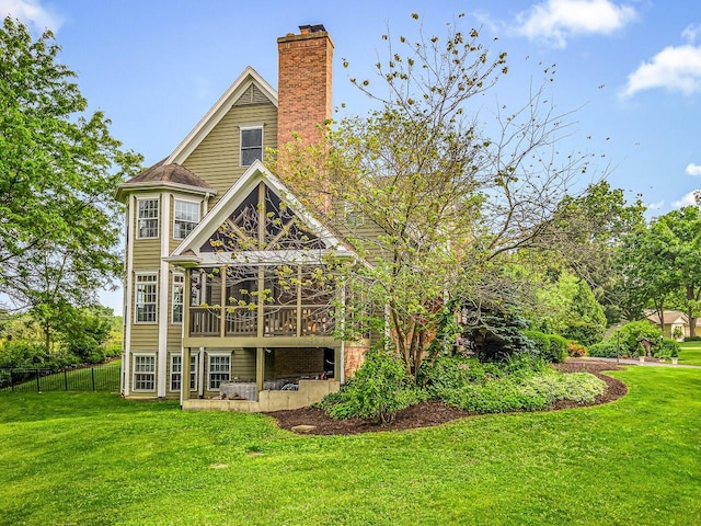 2207 N Elmkirk Pkwy N, Mchenry, IL 60051 - rear view of property with a chimney and a wooden deck