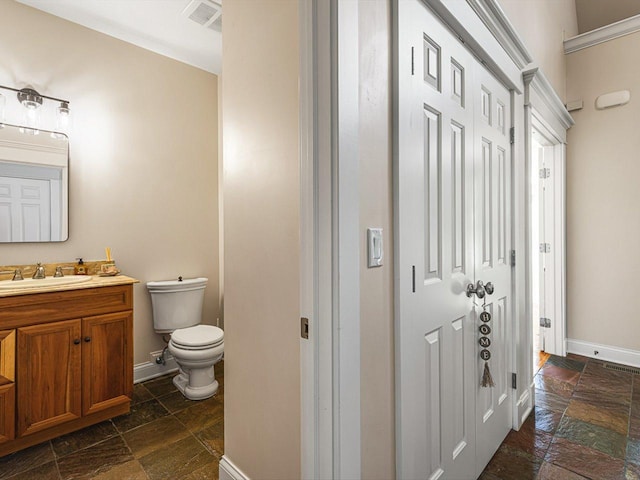 2207 N Elmkirk Pkwy N, Mchenry, IL 60051 - bathroom featuring stone tile flooring and vanity