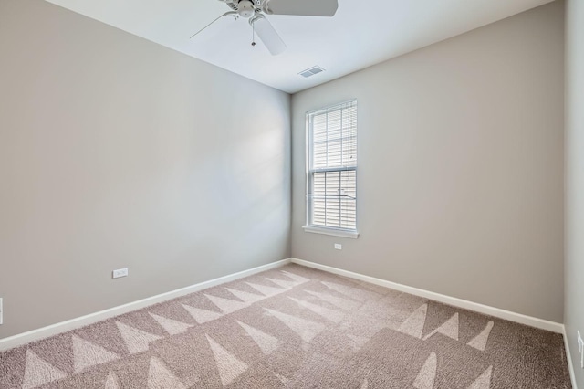 13490 Honeysuckle Dr, Huntley, IL 60142 - spare room with a ceiling fan and light colored carpet