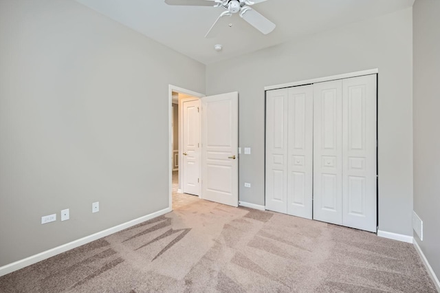13490 Honeysuckle Dr, Huntley, IL 60142 - unfurnished bedroom with carpet flooring, a closet, and a ceiling fan