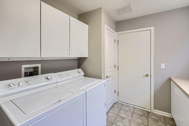 13490 Honeysuckle Dr, Huntley, IL 60142 - laundry room featuring cabinet space and independent washer and dryer