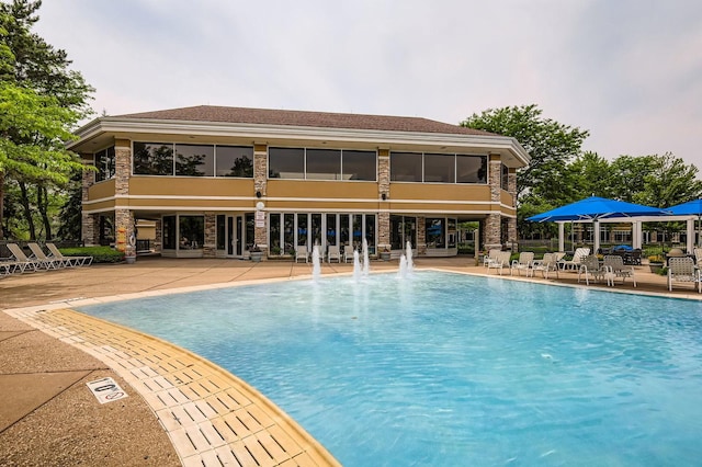 13490 Honeysuckle Dr, Huntley, IL 60142 - community pool with a patio