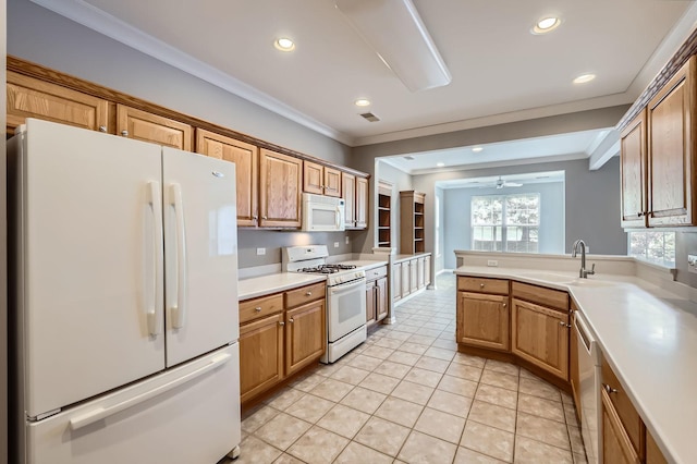 13490 Honeysuckle Dr, Huntley, IL 60142 - kitchen featuring white appliances, crown molding, recessed lighting, light countertops, and light tile patterned floors