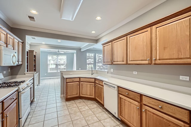 13490 Honeysuckle Dr, Huntley, IL 60142 - kitchen featuring white appliances, crown molding, light countertops, a peninsula, and recessed lighting