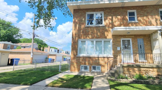 5448 N Washtenaw Ave, Chicago, IL 60625 - multi unit property with brick siding and a gate