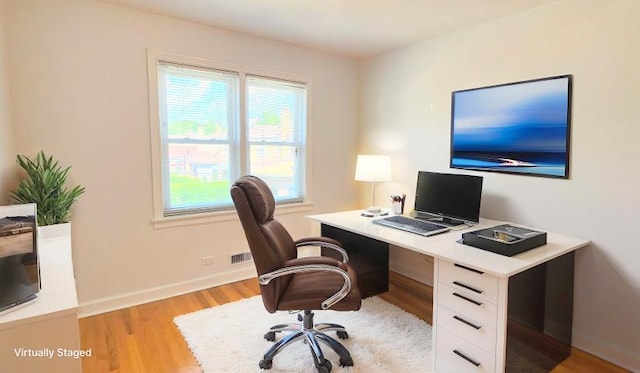 5448 N Washtenaw Ave, Chicago, IL 60625 - office featuring light wood-style floors and baseboards