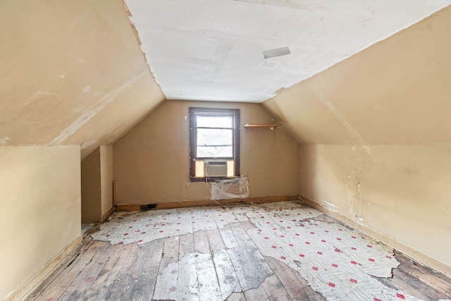 5212 S Honore St, Chicago, IL 60609 - bonus room featuring hardwood / wood-style flooring, vaulted ceiling, and cooling unit